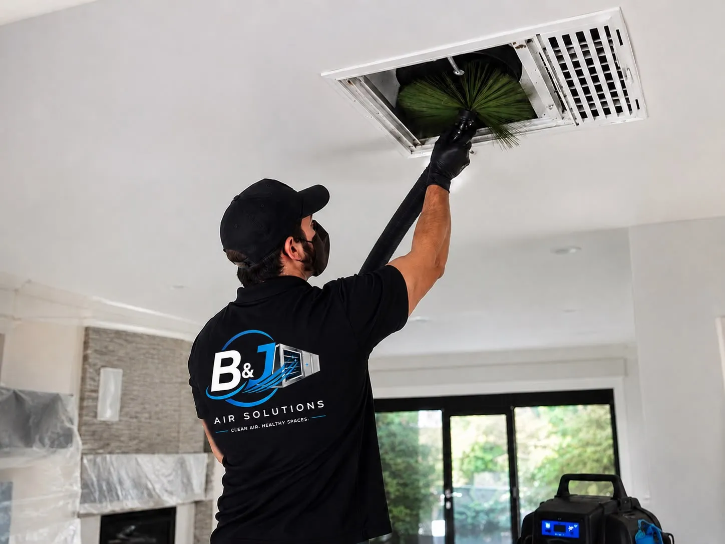 Professional HVAC technician working on ductwork