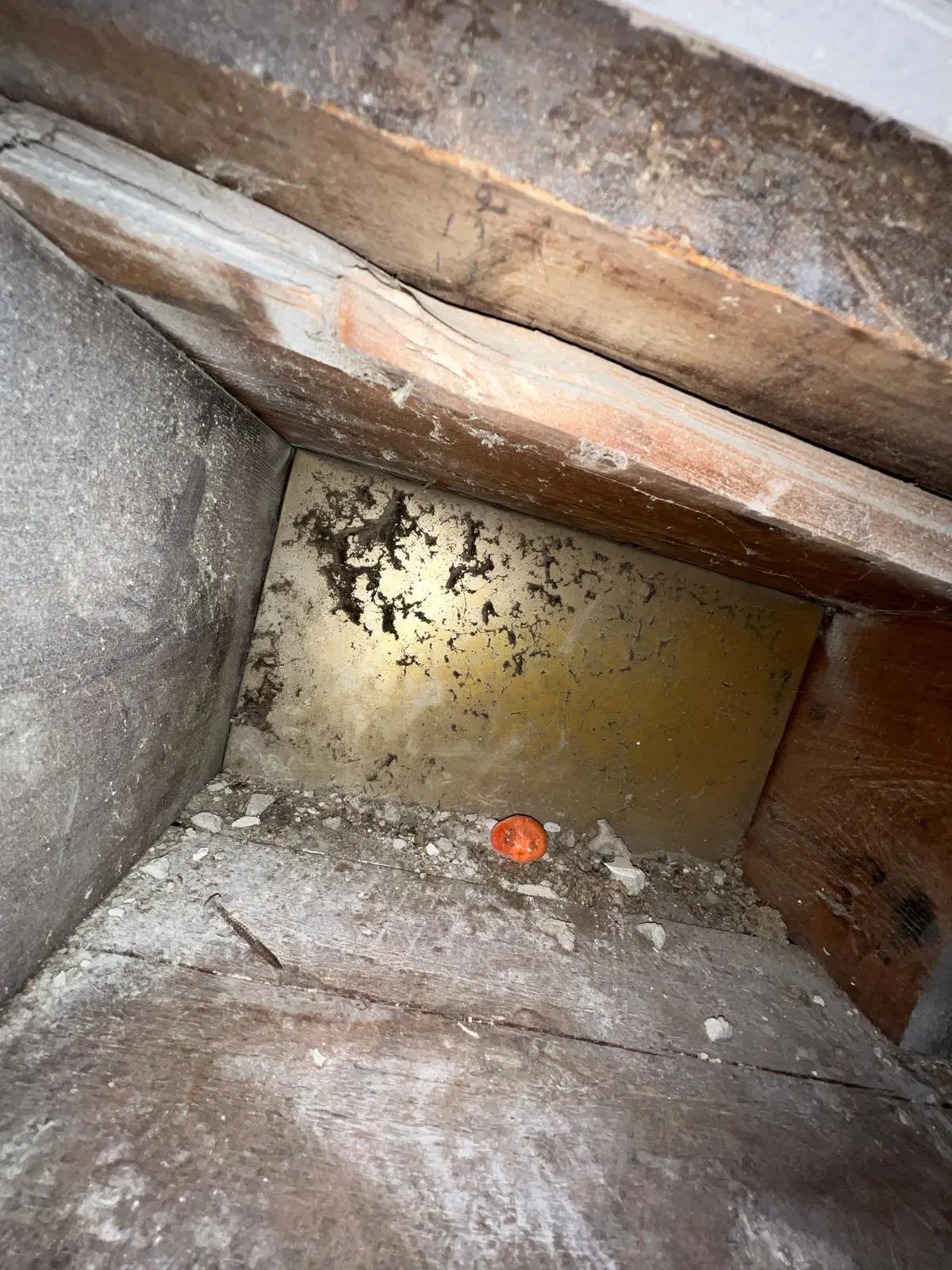 Duct before cleaning — heavy dust and debris buildup